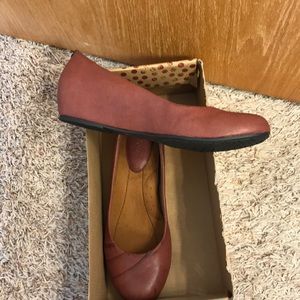 Size 10 Merlot flats with a small wedge.